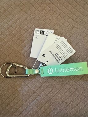 NWT, Lululemon silicone key chain  in mint green.